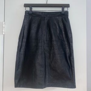 Black knee length leather skirt